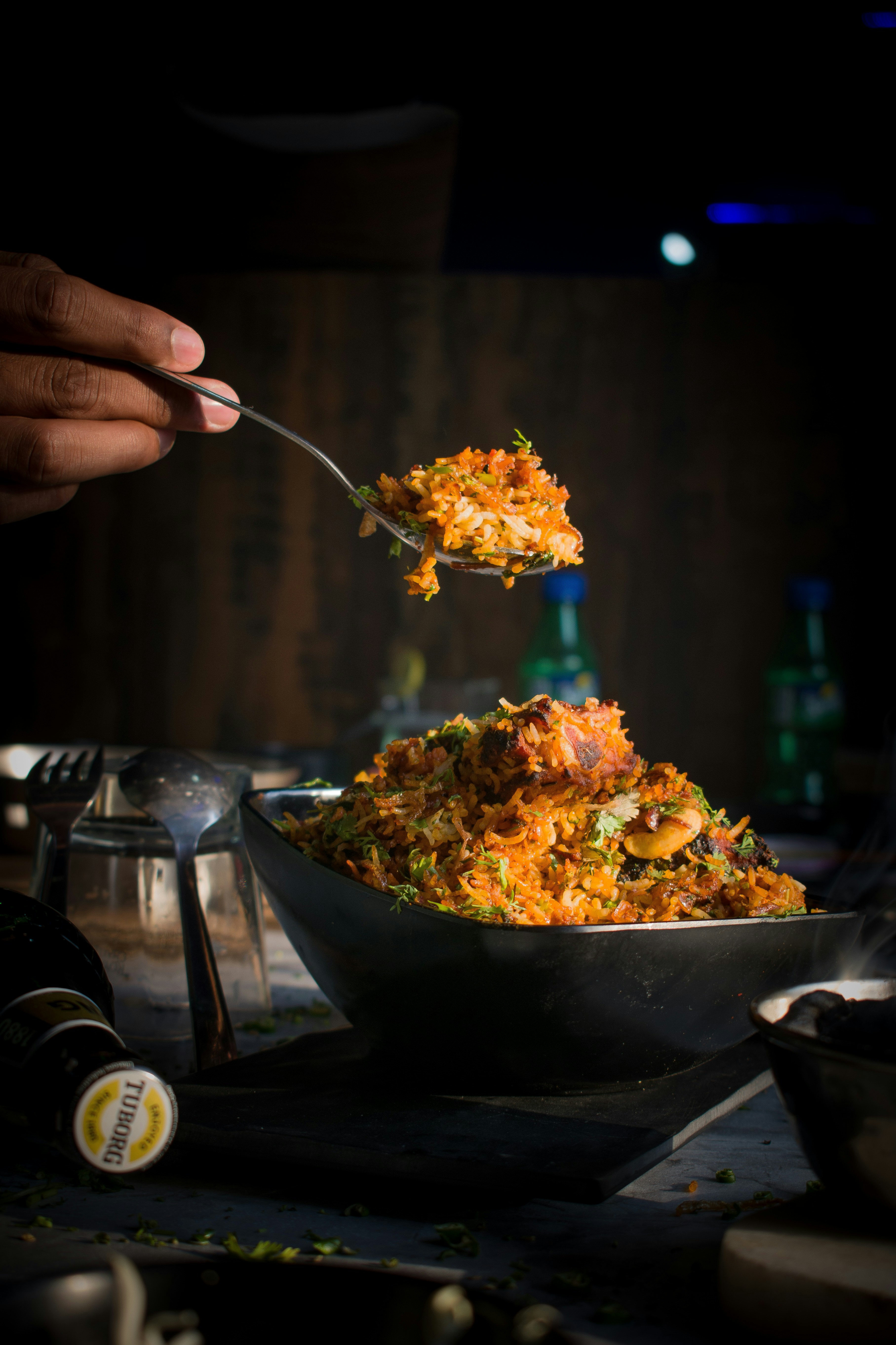A plated Hyderabadi biryani with saffron rice