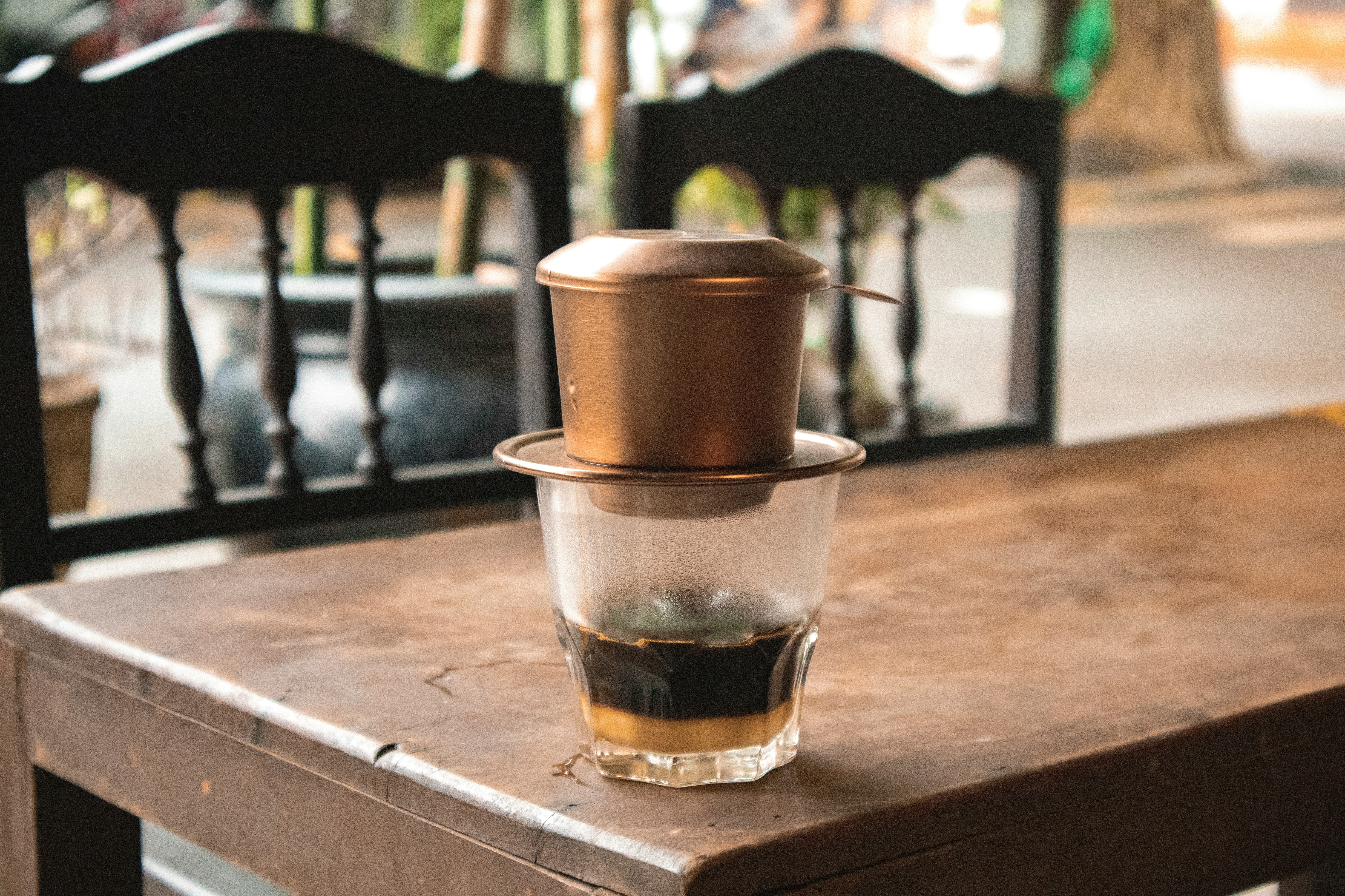 South Indian filter coffee in a steel tumbler