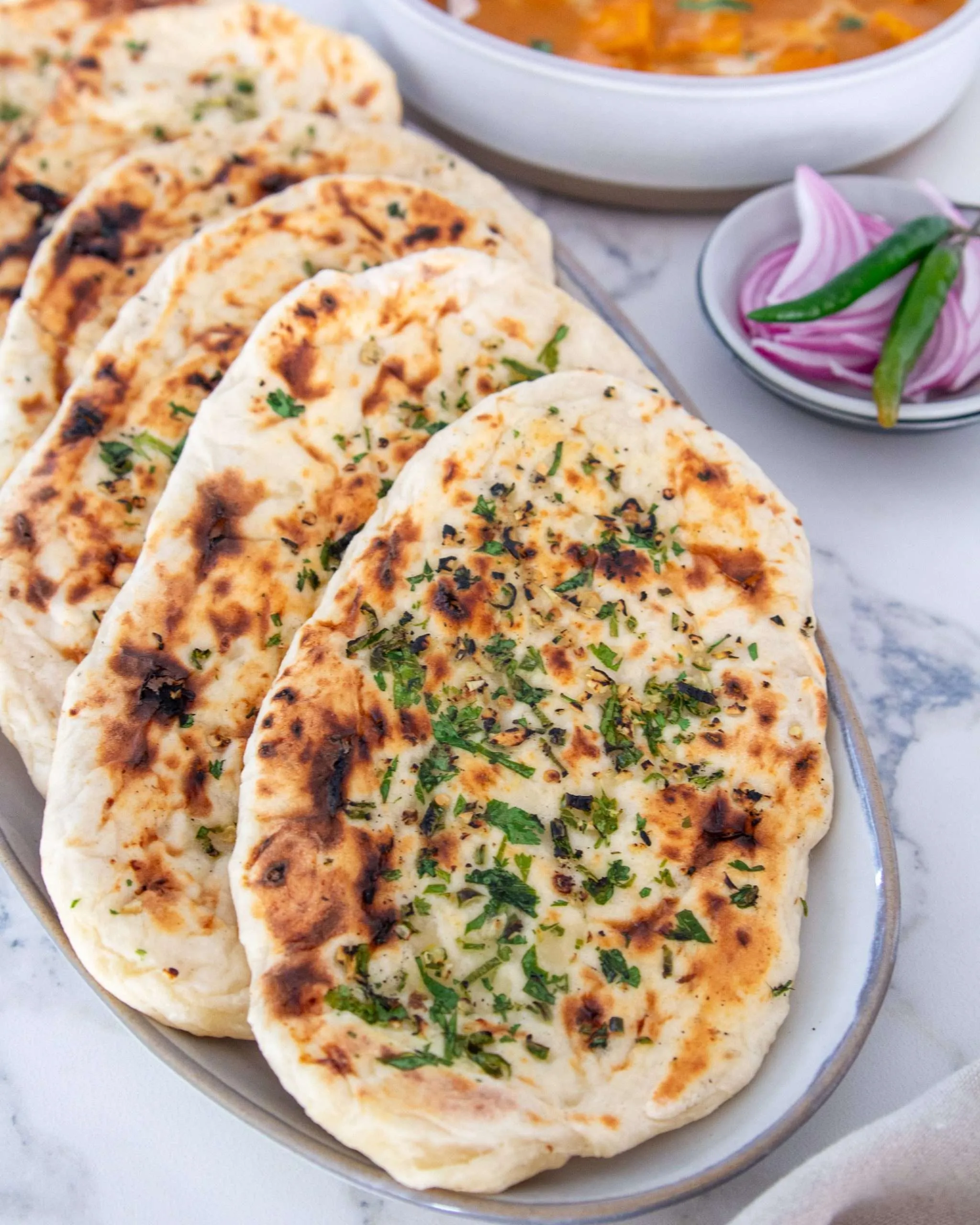 Garlic naan fresh from the tandoor